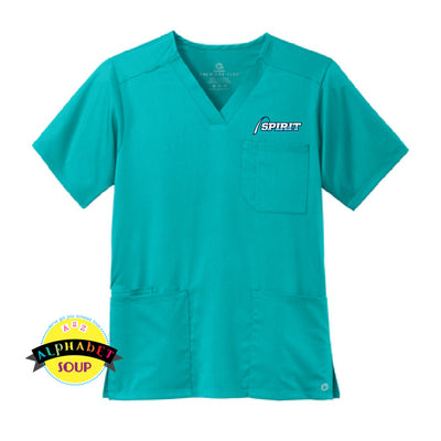 WonderWink scrub top embroidered with the Spirit Physical Therapy logo