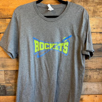 Gray t-shirt with 'ROCKETS' print on a wooden surface