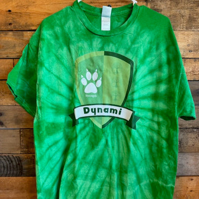 Green tie-dye t-shirt with a logo on a wooden surface