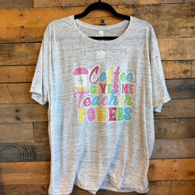 tshirt with colorful text design on a wooden surface