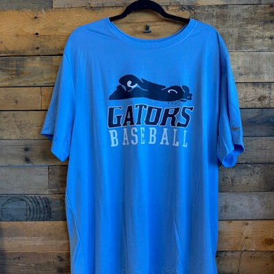 Blue sleeveless shirt with 'Gators Baseball' text on a wooden background
