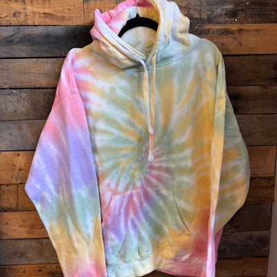 Tie-dye hoodie on a wooden surface