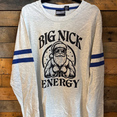 White t-shirt with black graphic and text on a wooden surface