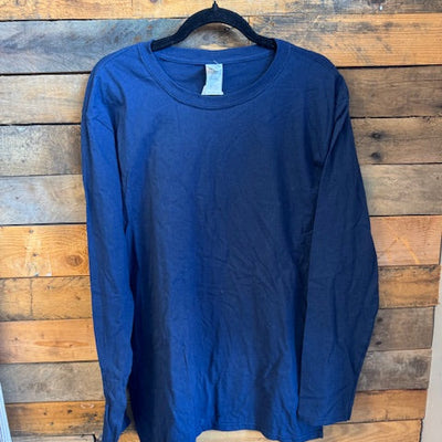 blue shirt on a wooden surface