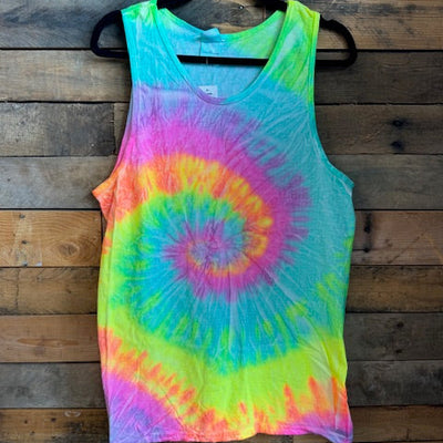 Colorful tie-dye tank top on a wooden surface