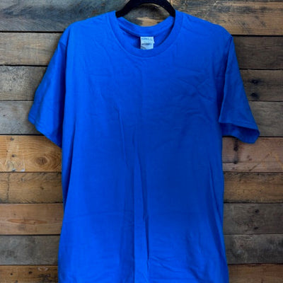 Blue t-shirt on a wooden surface