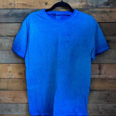 Blue shirt on a wooden surface