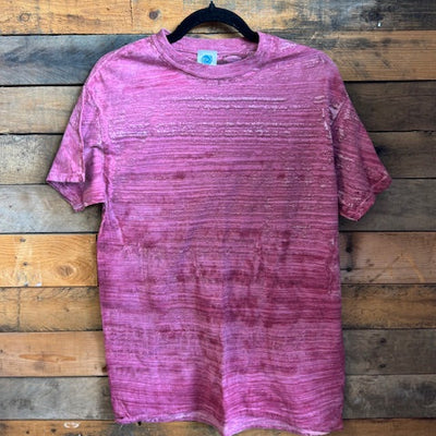 maroon t-shirt on a wooden surface