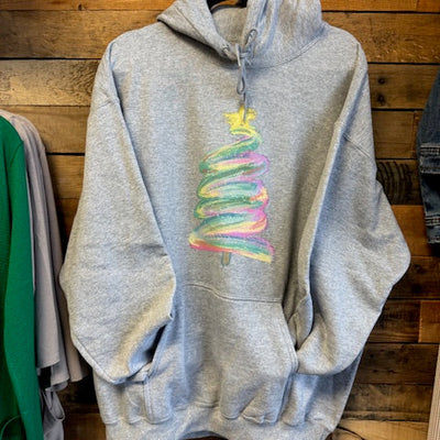 gray hoodie with colorful design on a wooden surface