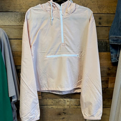 pink jacket on a wooden surface