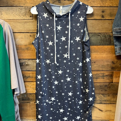 navy blue dress with white star pattern on a wooden surface