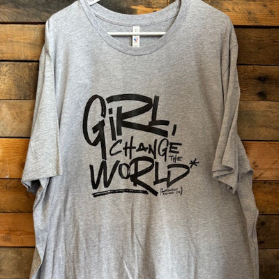 Gray top with black text on a wooden surface