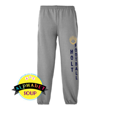 Sweatpants with elastic cuff bottoms and Holt Football personalization.