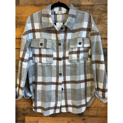 Plaid shirt on a wooden background