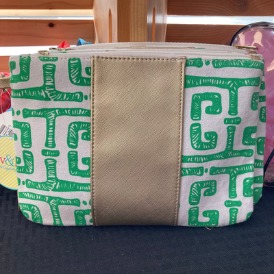 green and cream clutch