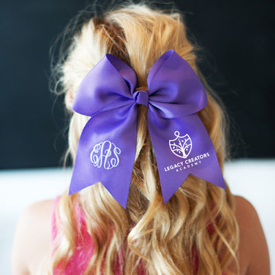 Legacy Creators Academy logo on a Hair bow.