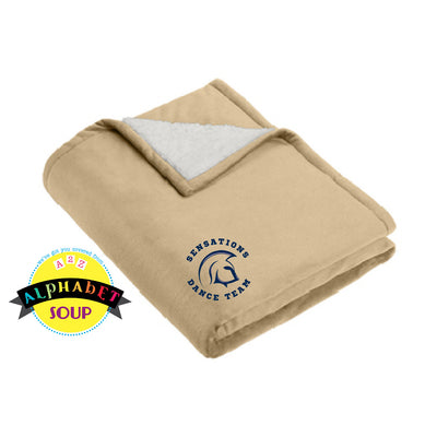 FHC Sensations logo on mountain lodge blanket in beige