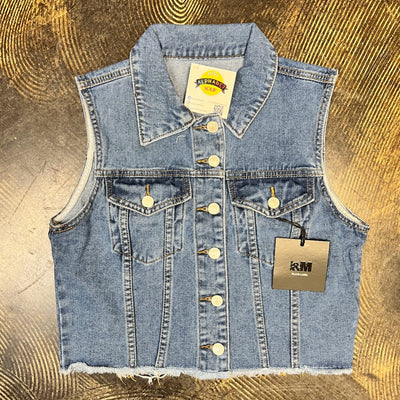 Denim vest with tags on a gold textured background
